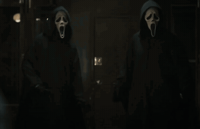 Two People In Scream Masks GIF