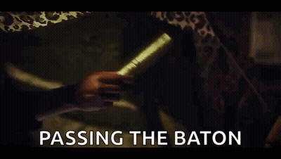 Two People Passing Baton Saying Passing The Baton GIF