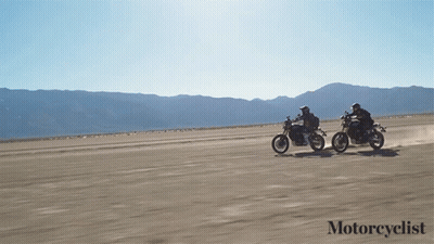 Two People Riding Motorcycles on Dirt Road Motoreyelist