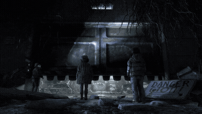 Two People Standing Before Danger Ghost Sign GIF