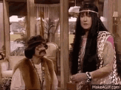 Two People Standing In Living Room GIF