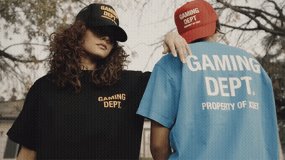 Two People Wearing Gaming Dept Shirts GIF