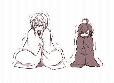 Two People Wrapped In Blankets GIF