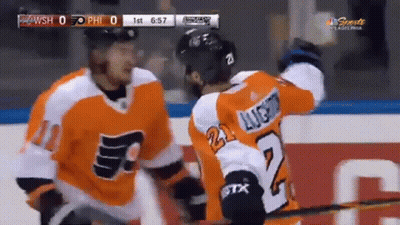 Two Philadelphia Flyers Hockey Players Celebrate A Goal GIF