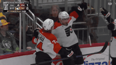 Two Philadelphia Flyers Hockey Players Celebrate A Goal GIF
