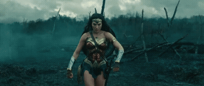 Two Pictures Of Woman And Man On Wall GIF