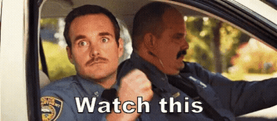 Two Police Officers Are Sitting In A Car With The Words Watch This Written On The Bottom . GIF