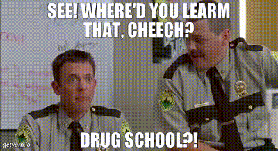 Two Police Officers Are Sitting In Front Of A White Board With The Caption See Where D You Learn That Cheech Drug School GIF
