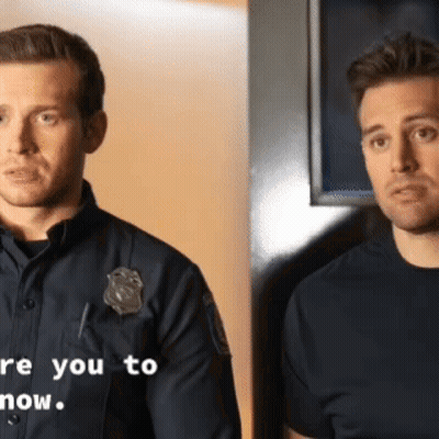 Two Police Officers Are Standing Next To Each Other With The Words " Are You To Now " On The Bottom Right GIF