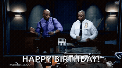 Two Police Officers Dancing In Front Of Happy Birthday Screen GIF