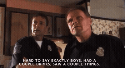 Two Police Officers Saying Hard To Say Exactly Boys GIF