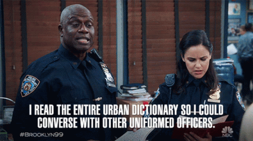 Two Police Officers Standing Next To Each Other With A Caption That Says I Read GIF
