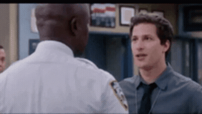 Two Police Officers Talking GIF