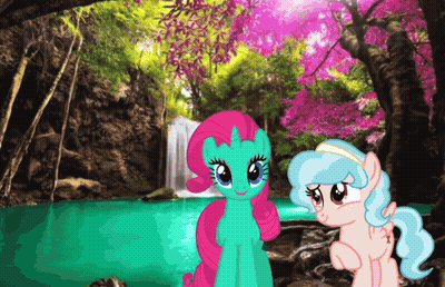Two Ponies Are Standing In Front Of A Waterfall In A Forest GIF