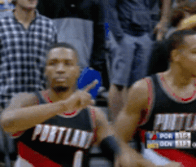 Two Portland Basketball Players Are Pointing At Something GIF