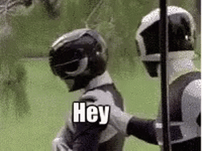 Two Power Rangers One Helmeted Saying Hey GIF