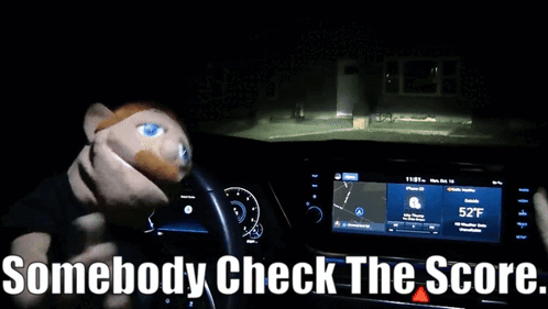 Two Puppets In A Car With The Words " Somebody Check The Score " Above Them GIF