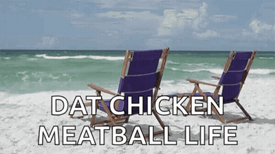 Two Purple Beach Chairs On The Beach With The Words " Dat Chicken Meatball Life " Above Them GIF