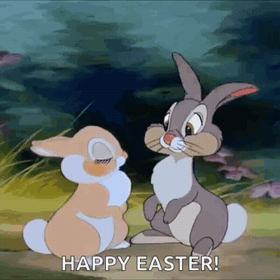 Two Rabbits Are Sitting Next To Each Other In A Field And The Words `` Happy Easter '' Are On The Bottom . GIF