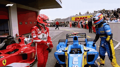 Two Race Car Drivers Side By Side GIF
