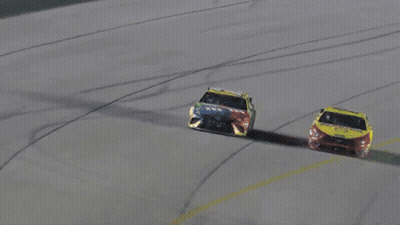 Two Race Cars Racing With Coca Cola Sticker GIF