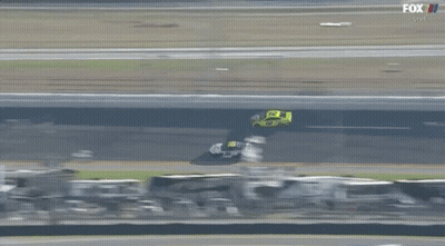 Two Race Cars Racing With Fox Live Logo