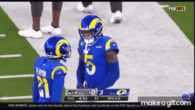 Two Rams Football Players Talking On Field GIF