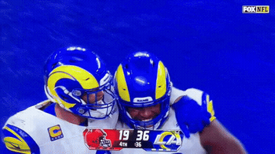 Two Rams Players Hugging GIF