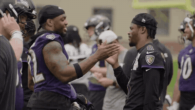 Two Ravens Players High Five GIF