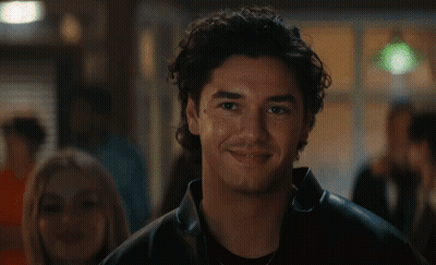 Two Red Hearts With Boy And Kiss GIF