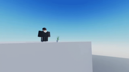 Two Roblox Characters Are Standing On Top Of A White Block GIF