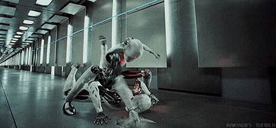 Two Robots Are Fighting In A Hallway With The Words Arkvgifs Tumblr Visible GIF