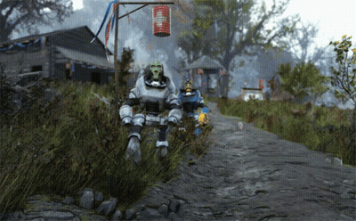 Two Robots Are Walking Down A Dirt Road With A Red Lantern In The Background GIF
