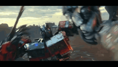 Two Robots Fighting One With Blue Light GIF