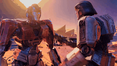 Two Robots Shaking Hands In Desert Landscape GIF