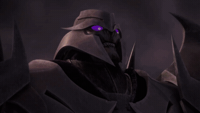 Two Robots Standing Next To Each Other One With Letter O On Head GIF