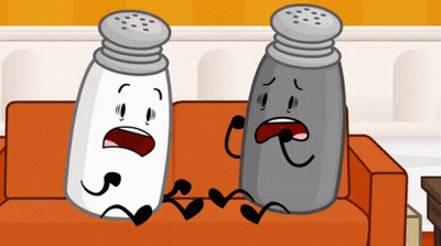 Two Salt And Pepper Shakers Are Sitting On A Couch With Their Mouths Open GIF