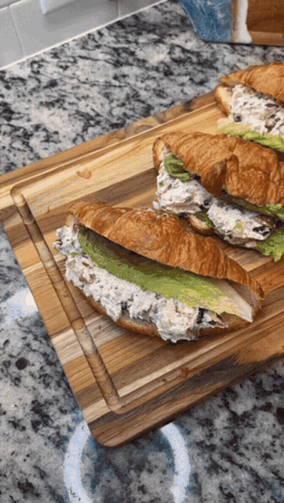 Two Sandwiches On Wooden Cutting Board GIF