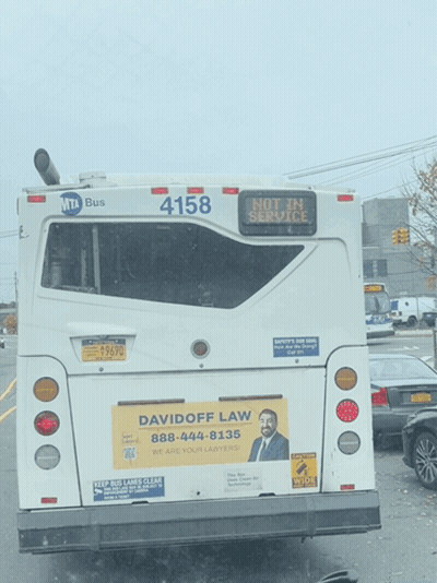 Two School Buses Parked Together With Foundation Logo GIF