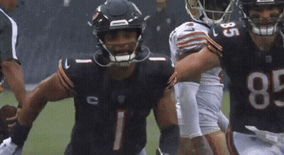 Two Seahawks Players Hugging GIF