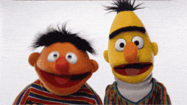 Two Sesame Street Characters Smiling GIF