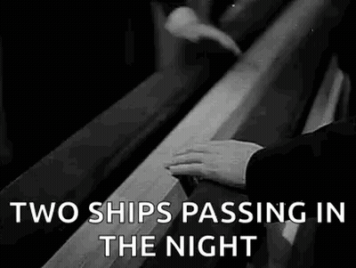 Two Ships Passing In The Night Black And White Photo Of Man On Bench GIF