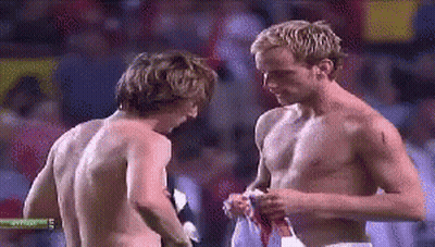 Two Shirtless Men GIF
