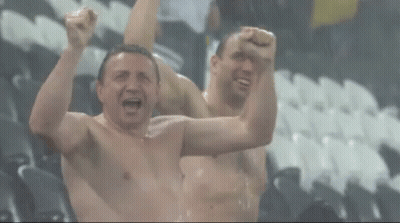 Two Shirtless Men Are Cheering With The Words Rain Delay Written On The Bottom GIF