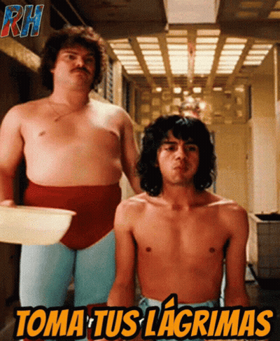 Two Shirtless Men Are Standing Next To Each Other With The Words Toma Tus Lagrimas Written On The Bottom GIF