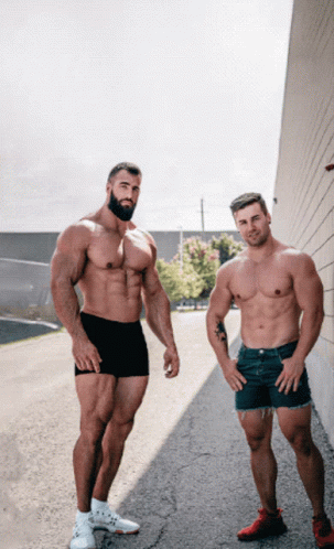 Two Shirtless Men Side By Side GIF