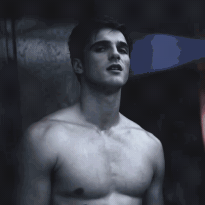 Two Shirtless Men Standing In A Room GIF