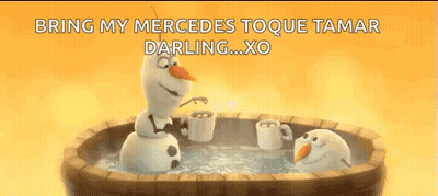 Two Snowmen in Wooden Tub With Hot Chocolate