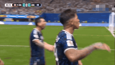 Two Soccer Players Are Celebrating A Goal During A Game Between England And Argentina GIF