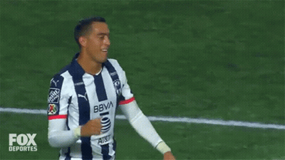 Two Soccer Players Are Giving Each Other A High Five On A Field Sponsored By Fox GIF